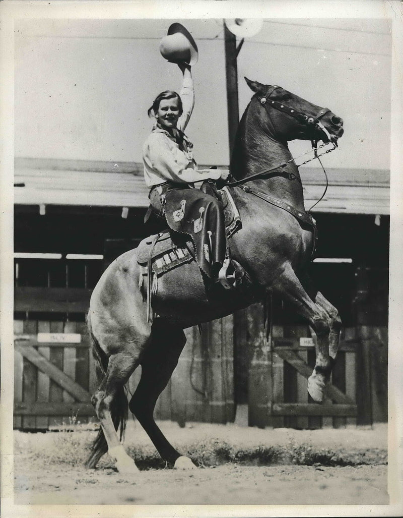 Lucille Hansen, a Redwood Empire Saddle Queen, performs thrilling trick riding in Western fashion at the Ukiah Rodeo. - Vintage Photograph