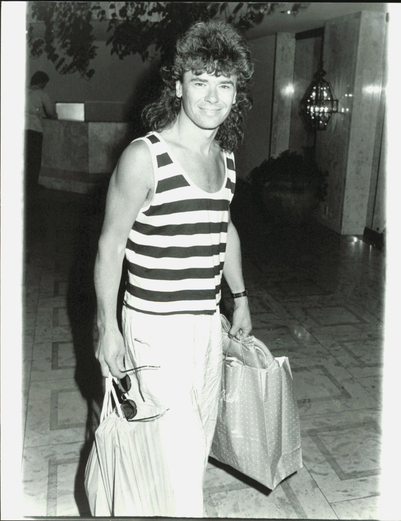 Tim Ferris of INXS at his hotel in Hollywood - Vintage Photograph