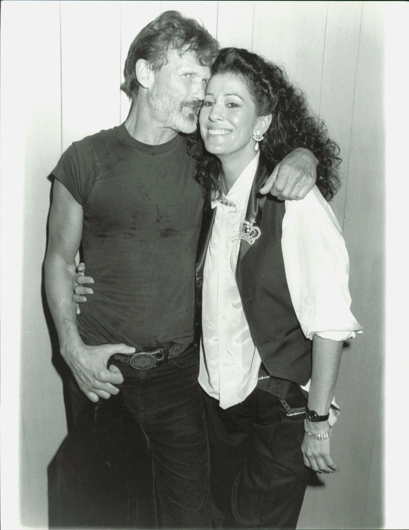 Kris Kristofferson and Rita Coolidge at the Los Angeles Forum for the Welcome Home Vietnam Veterans event - Vintage Photograph