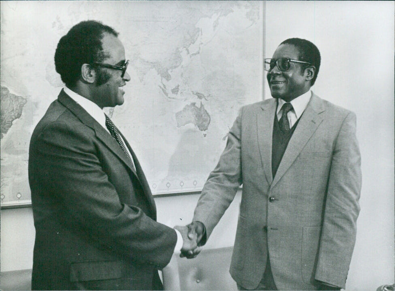 Meeting between Prime Minister of Zimbabwe Robert Mugabe and Tanzania's Permanent Representative to the United Nations Salim A. Salim at UN headquarters in New York. - Vintage Photograph