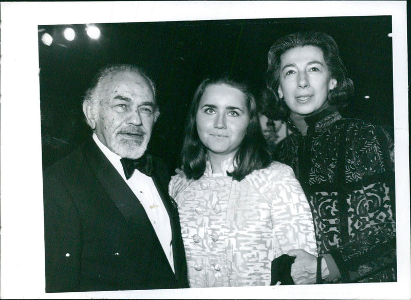 Edvard G. Robinson, his wife Jane, and granddaughter Francesca attend the Hollywood premiere of "Song of Norway" - Vintage Photograph