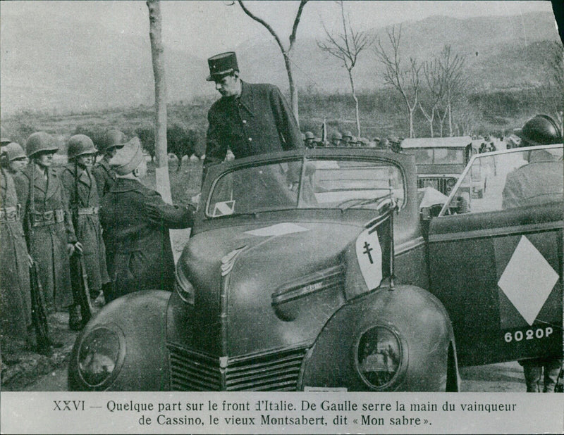 De Gaulle shakes hands with the winner of Cassino - Vintage Photograph