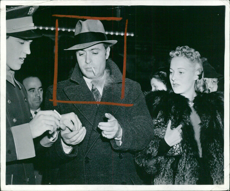 Charles Boyer and his wife attend the preview of "Love Affair" - Vintage Photograph