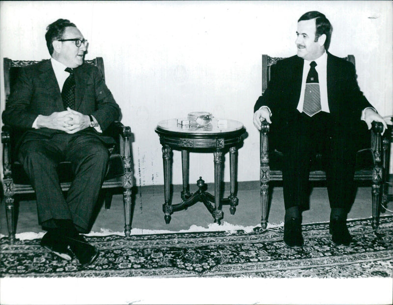 Dr. Henry Kissinger meets with President Hafez el Assad of Syria - Vintage Photograph