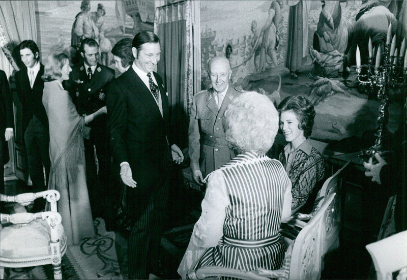 Marquis of Villaverde and Francisco Franco in lively conversation with Queen Frederica of Greece and her daughter Queen Anne Marie of Greece. - Vintage Photograph