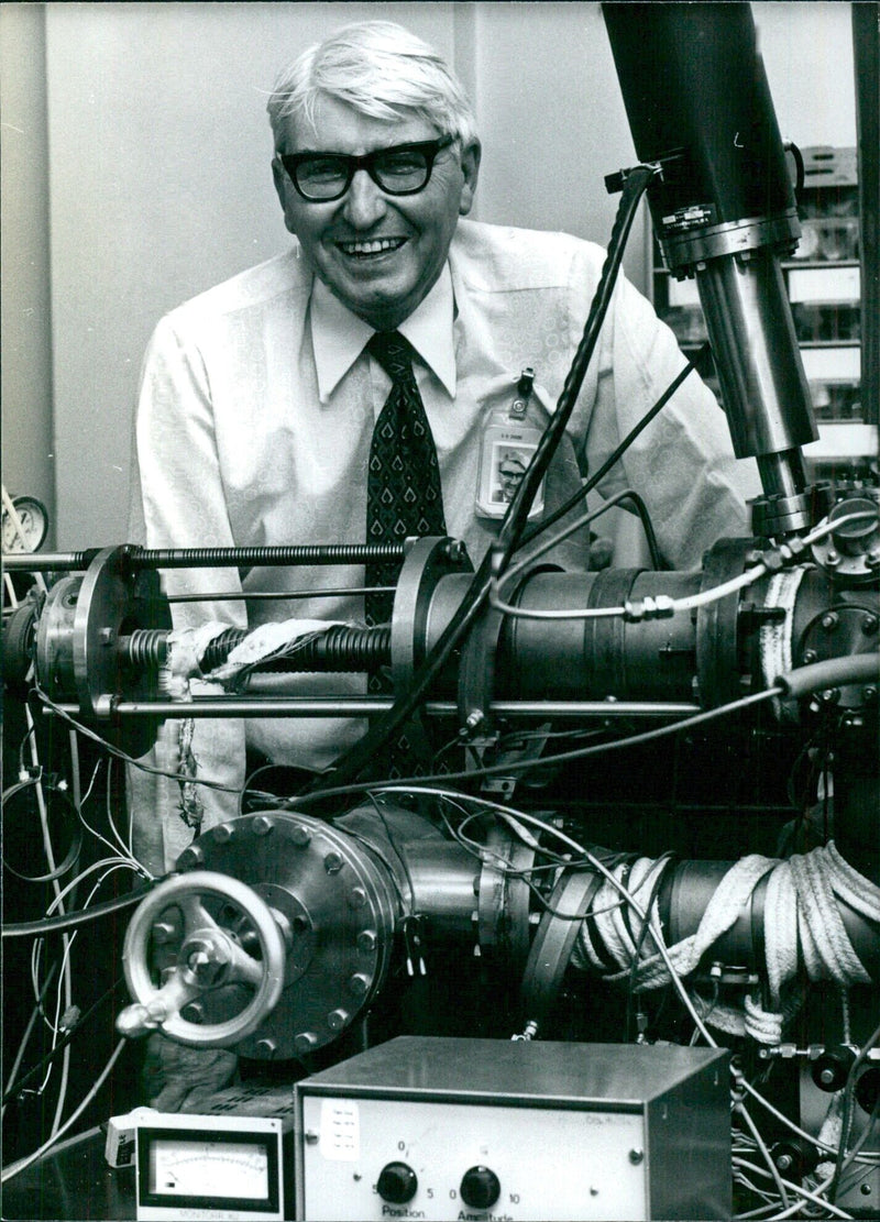 British Scientist Dr. David Jones with an electron spectro-mater - Vintage Photograph