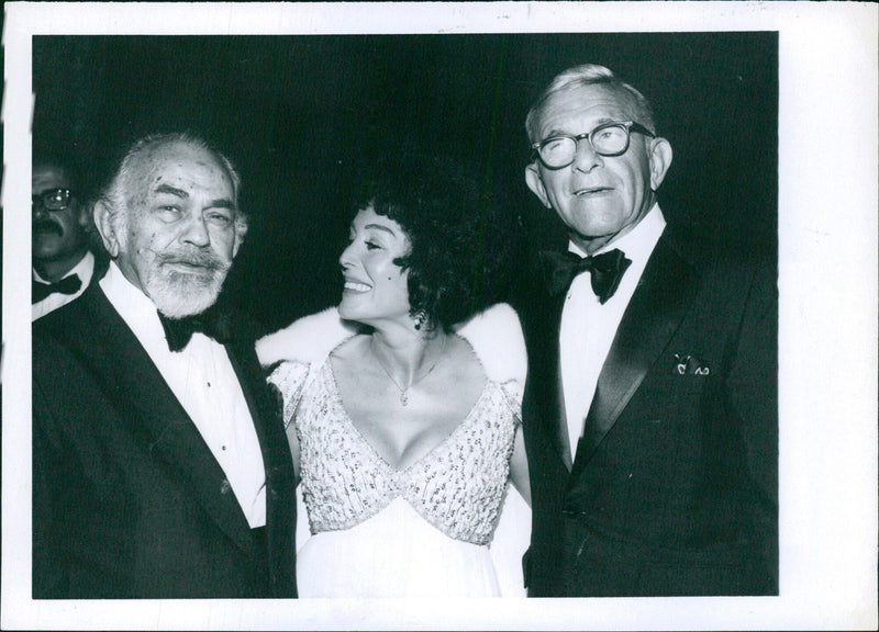 OV Eduard G. Robinson, Lita Baron and George Durns were among the 600 guests at the American Cancer Society Ambassador Hotel in Los Angeles. - Vintage Photograph