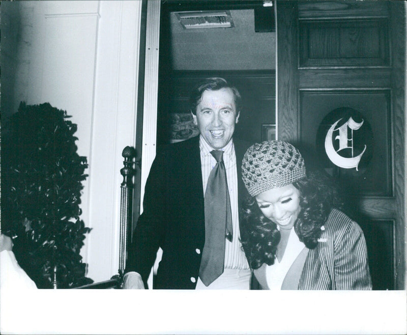 Dimann Carroll and David Frost leaving the "Candy Store" Hollywood night club - Vintage Photograph