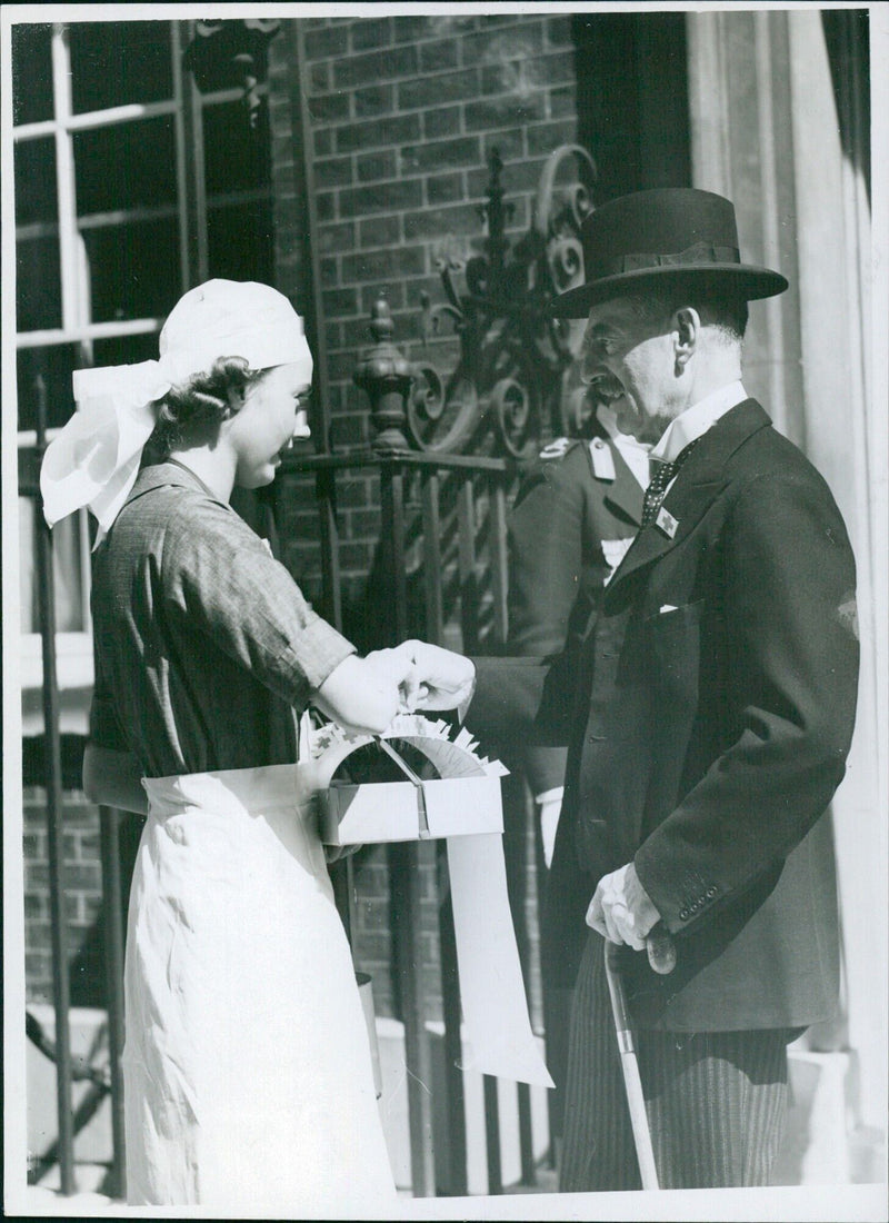 Chamberlain buys Red Cross flag on collection day - Vintage Photograph