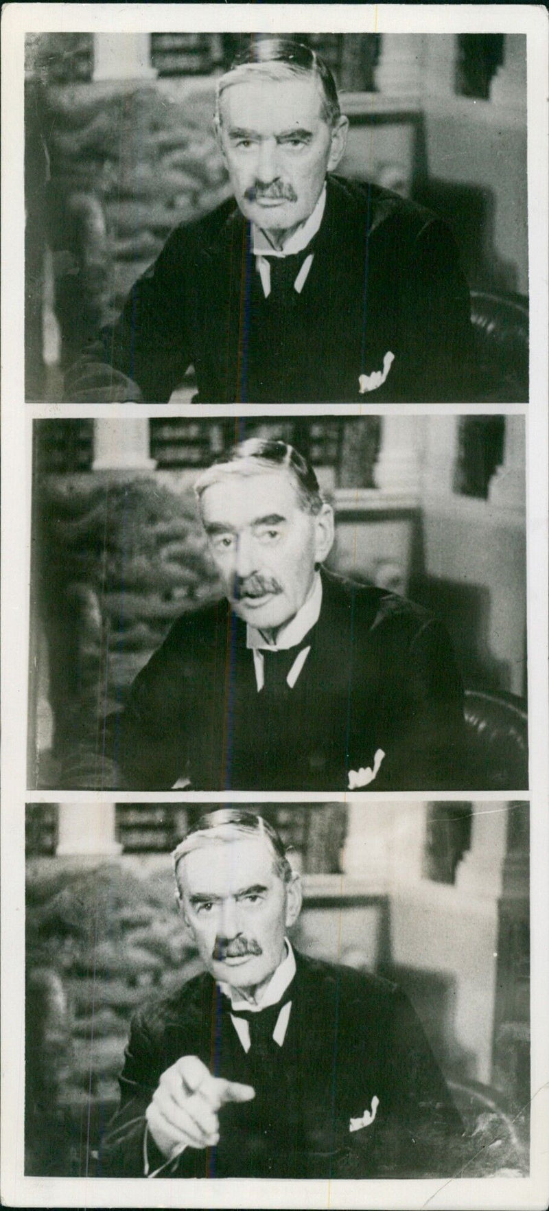 Prime Minister Chamberlain in conversation at his desk - Vintage Photograph