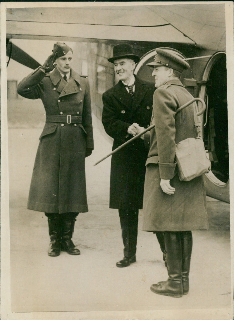 British Prime Minister Neville Chamberlain arrives in France for negotiations with the French government. - Vintage Photograph