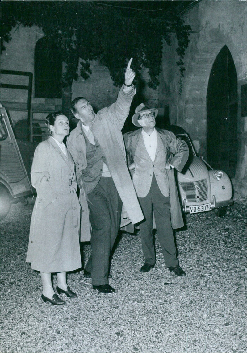 J. Francois Hand explains the details of the era Mad. Sumen on a mule in scene at Chateau d'Echanders. - Vintage Photograph