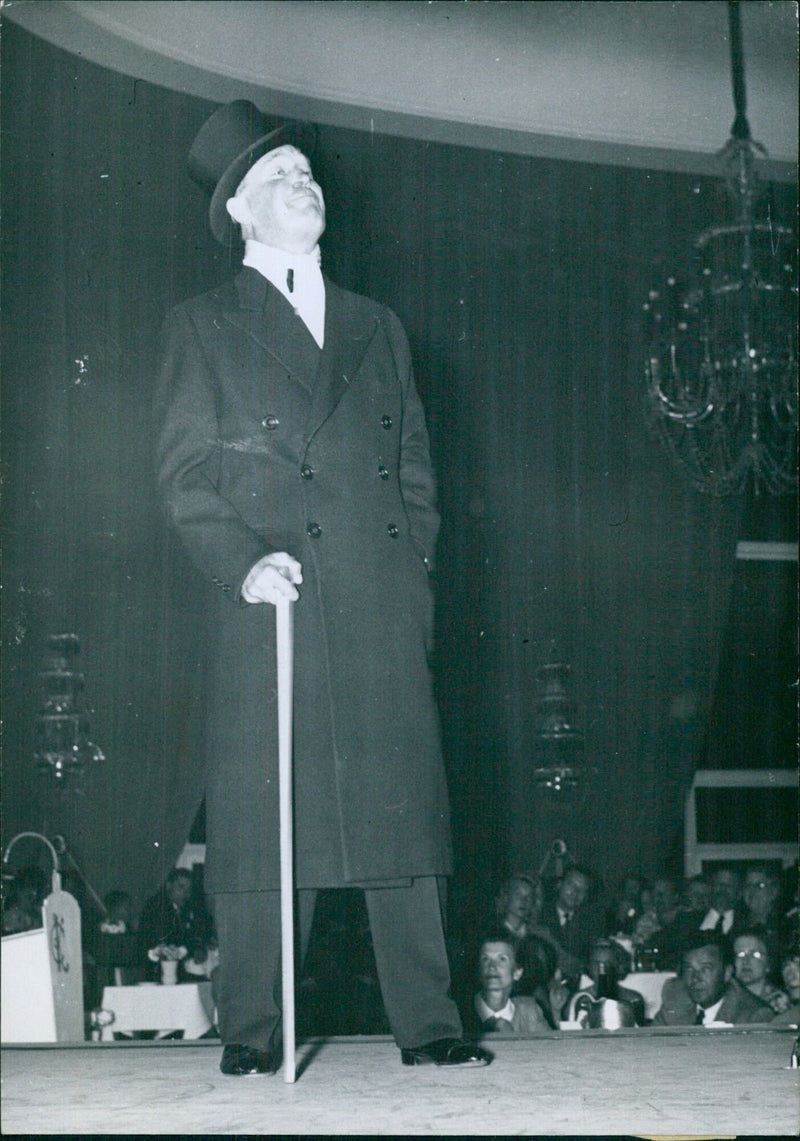 Maurice Chevalier performing a striptease act - Vintage Photograph