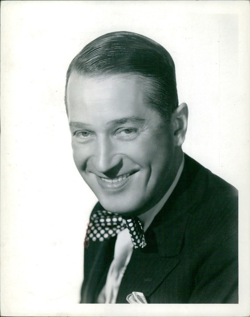 Maurice Chevalier posing for photographer Clarence Sinclair Bull - Vintage Photograph