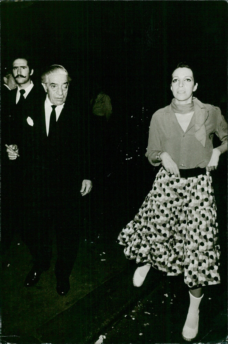 Christina Onassis accompanies her father during an evening out in Paris - Vintage Photograph