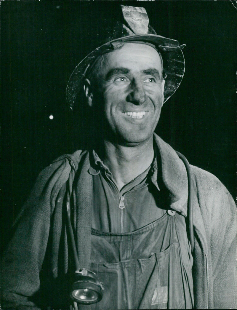 A happy miner - Vintage Photograph