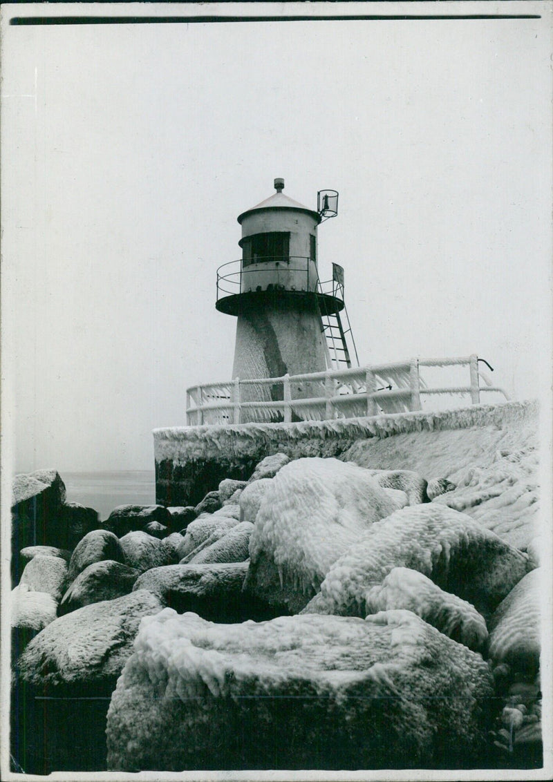 Winter - or Limhamn harbor lighthouse in winter attire. - Vintage Photograph