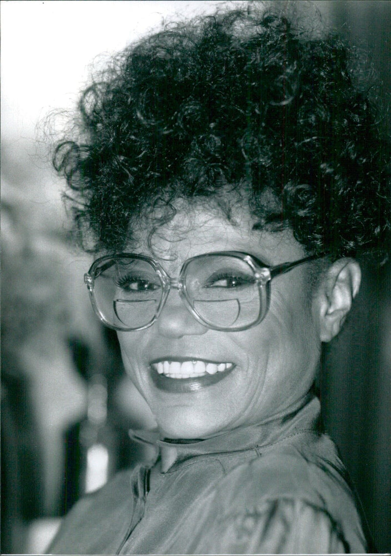 Eartha Kitt wearing bifocals - Vintage Photograph