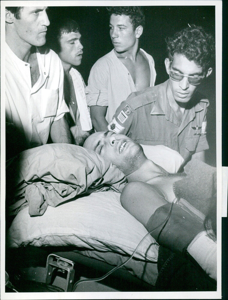 Capt. Yigal Shohat in the hospital grounds on the way to his ward. - Vintage Photograph