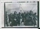 German military men marching along the streets of Denmark. - Vintage Photograph