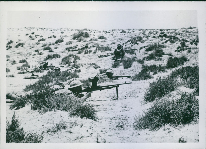 British troops fighting in the desert. - Vintage Photograph