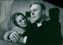Ingrid Thulin and Gunnar BjÃ¶rnstrand in the Swedish film NattvardsgÃ¤sterna. - Vintage Photograph