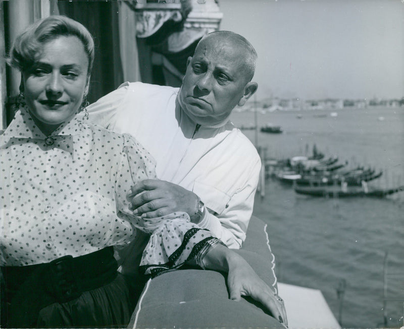 Erich von Stroheim with his wife in Venice during the Film Festival. - Vintage Photograph