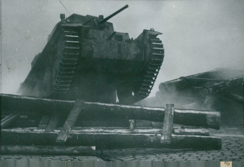 Low angle view of an army tank. - Vintage Photograph