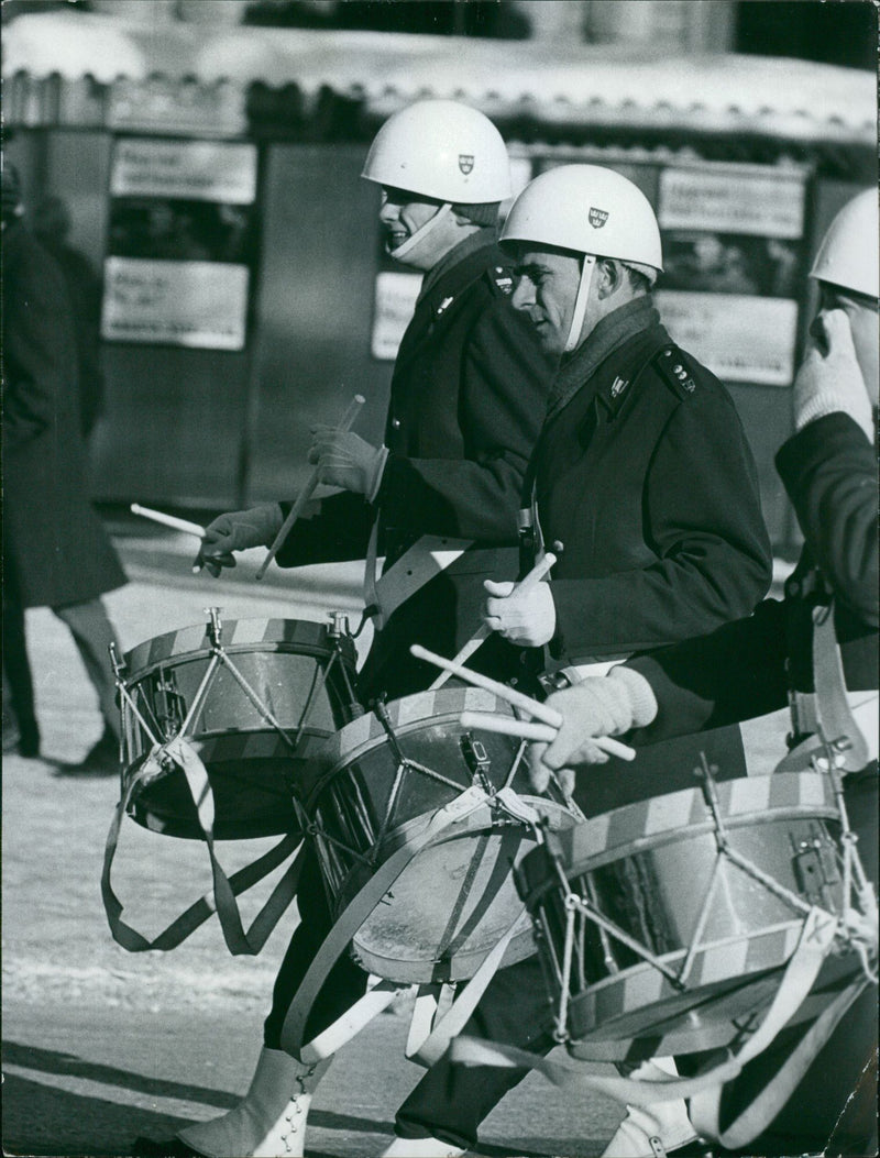 Military guards standing and playing drum. - Vintage Photograph