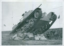 Svea Life Guards tank inclined over the sack. - Vintage Photograph