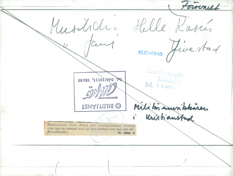 Military men standing and holding a drum. - Vintage Photograph