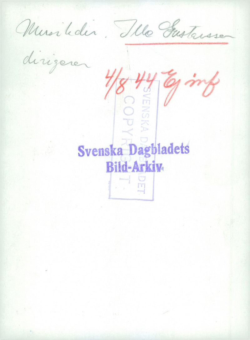 Military man standing and directing the army band group. - Vintage Photograph