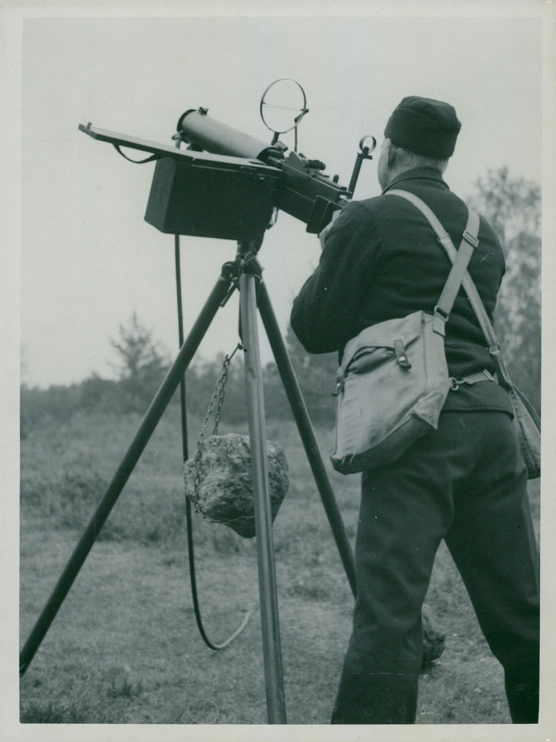 Soldier with a machine gun and bag of ammunition during the Vastervik maneuver 1937. - Vintage Photograph