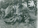 The renewed infantry. Troops taking a break during field control - Vintage Photograph