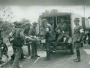 An "injured" soldier is carried aboard an ambulance during the VÃ¤stgÃ¶ta maneuver in 1931 - Vintage Photograph