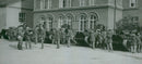 A photo of soldiers standing on their post beside them are military tankers. - Vintage Photograph