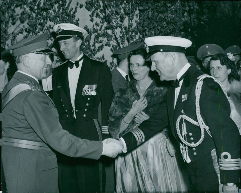 Karlbergs garden party at Karlberg. The head of the army general CA EhrensvÃ¤rd welcomes the Danish military attache commander JA Schou with his wife's welcome. - Vintage Photograph
