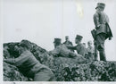 Landscape cadets behind a rock with the battalion commander at the Karlberg military school. - Vintage Photograph
