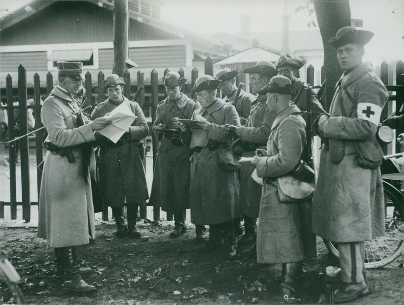 Soldiers gathered to meeting during a Field maneuver in 1931. - Vintage Photograph