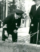 Celebration ceremony when the naval chief murders a green time capsule into the foundation of a new barracks building - Vintage Photograph