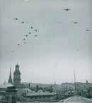 Third flygeskadern flying over the city of Stockholm. - 24 September 1947 - Vintage Photograph