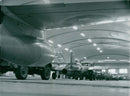 Mountain hangar with a Vampire Division on high alert. - Vintage Photograph