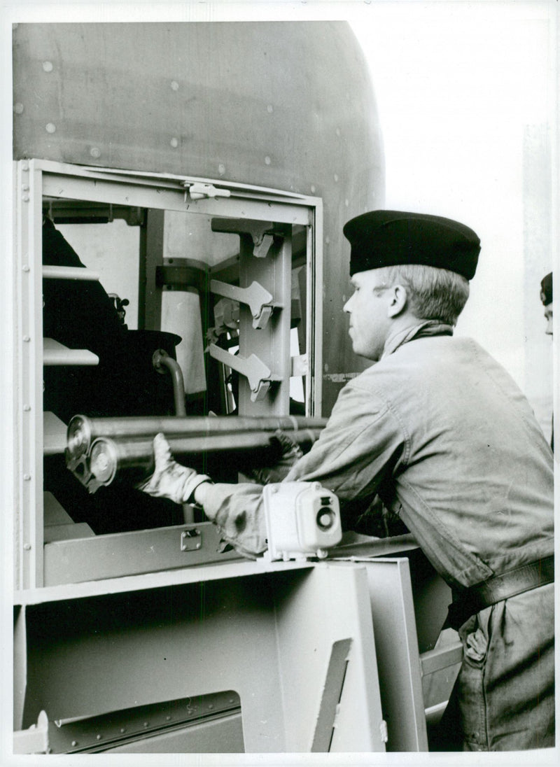 Crew loading weapons on one of the navy's frigates - Vintage Photograph