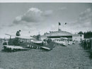Aircraft outside the newly built hangar - Year 1930 - Vintage Photograph
