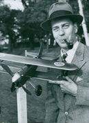 Model Racing at Ãstermalm Stadium. Here Mr C TÃ¶rner shows off a model of a J11. - Vintage Photograph