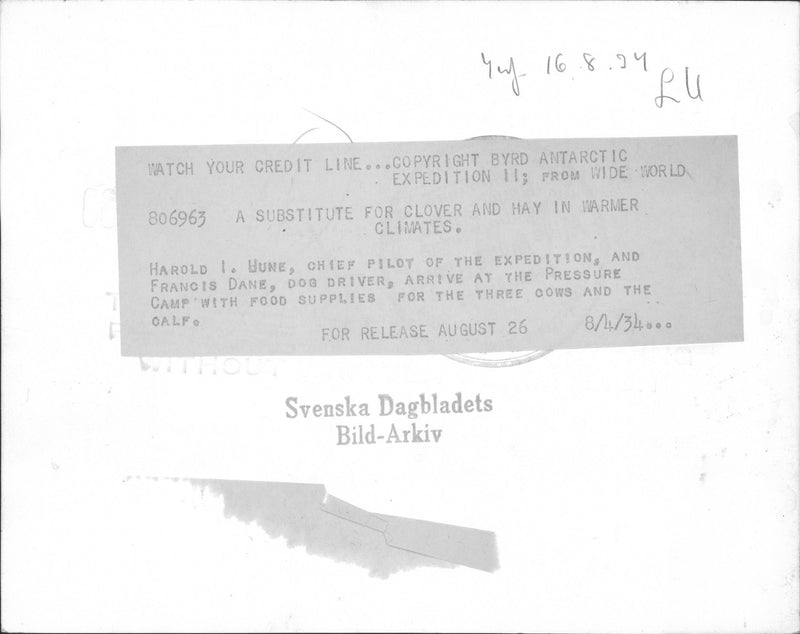 Harold I. Hune and Francis Dane arrive at the Pressure Camp with food supplies. - 16 August 1934 - Vintage Photograph