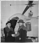 The chairmen of the Archipelago Association in front of the Archipelago ambulance helicopter. - Vintage Photograph