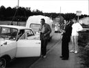 A caravan has been stopped and checked in Stockholm county's biggest ever road block. - Vintage Photograph