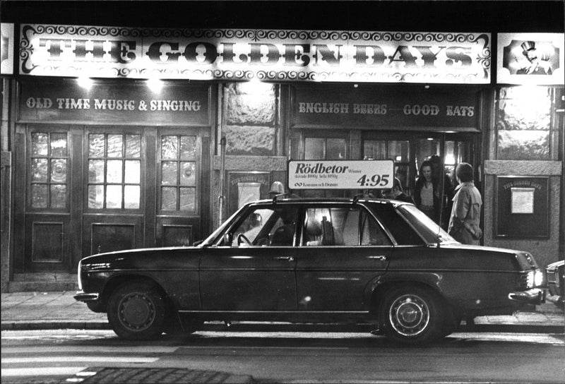 A taxi outside the English pub The Golden Days in Gothenburg. - Vintage Photograph
