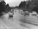 Cars on the highway in the rain - Vintage Photograph